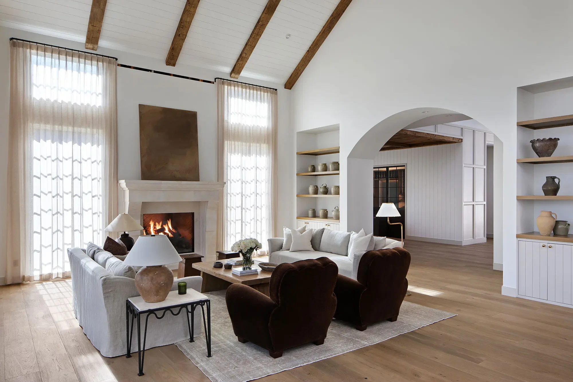 La Mesa by GHG Builders — great room with fireplace and beamed ceiling