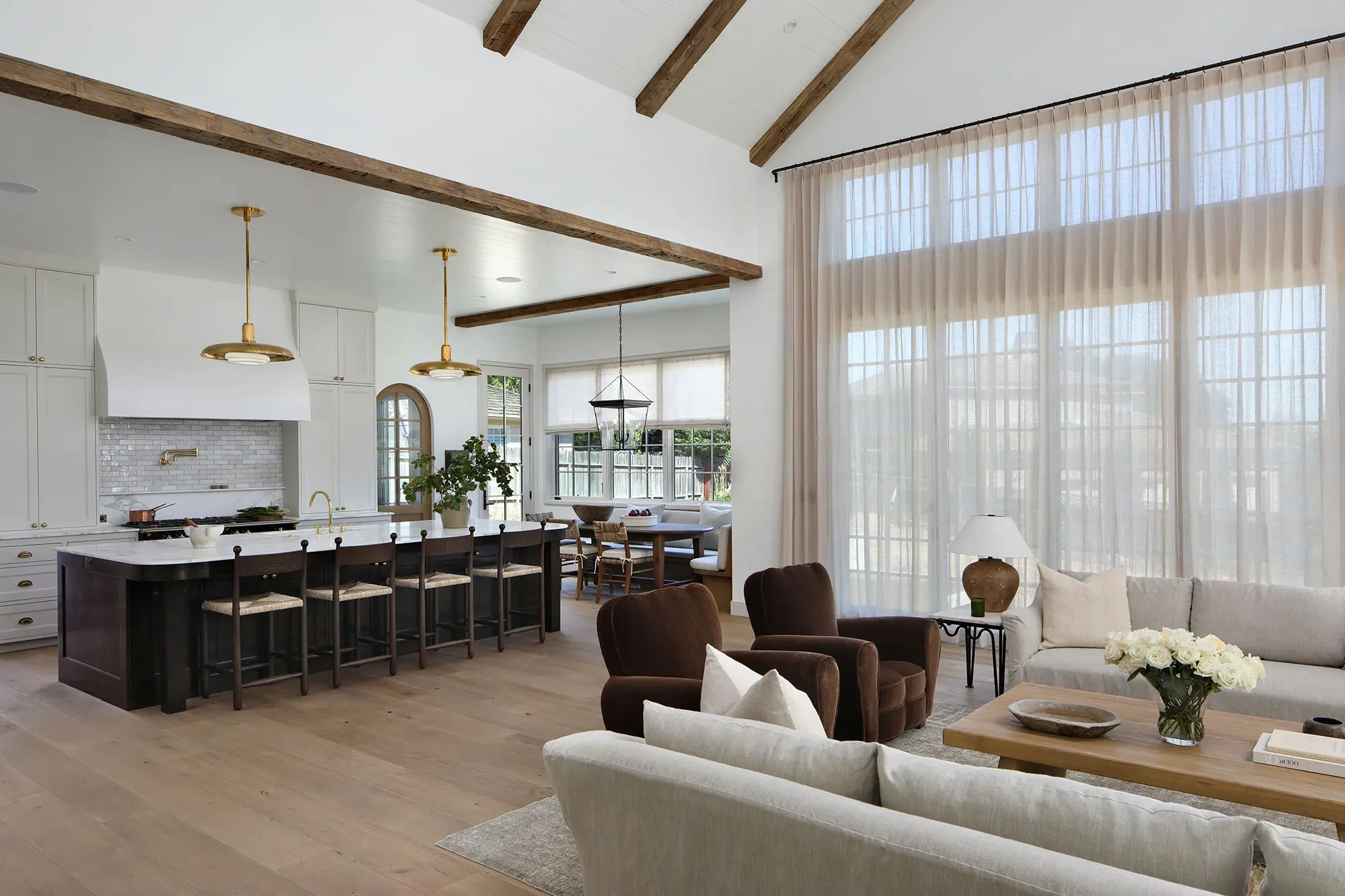 La Mesa by GHG Builders — open kitchen and living space with vaulted beams