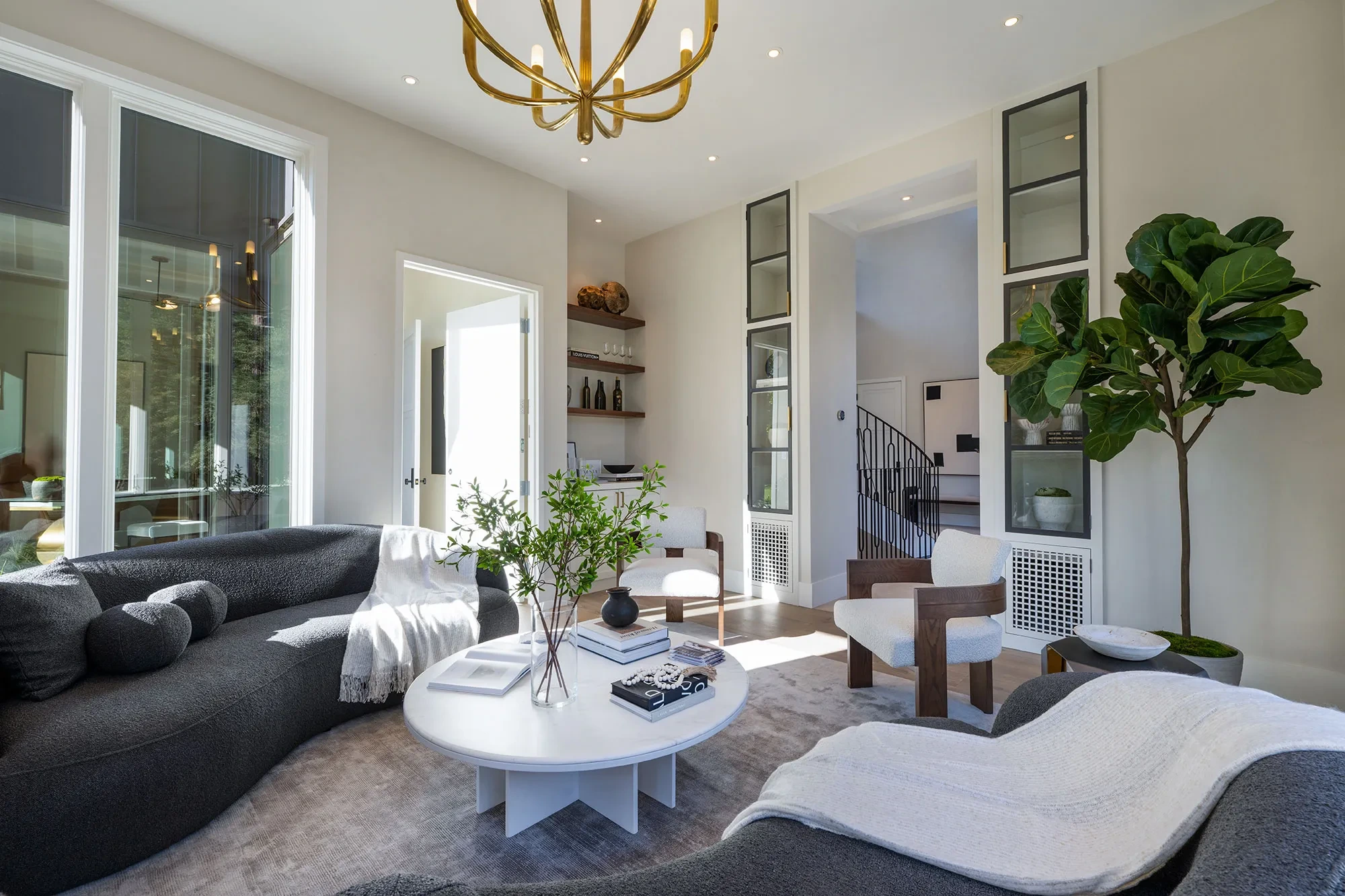 Shearer by GHG Builders — formal parlor with chandelier and double-height windows
