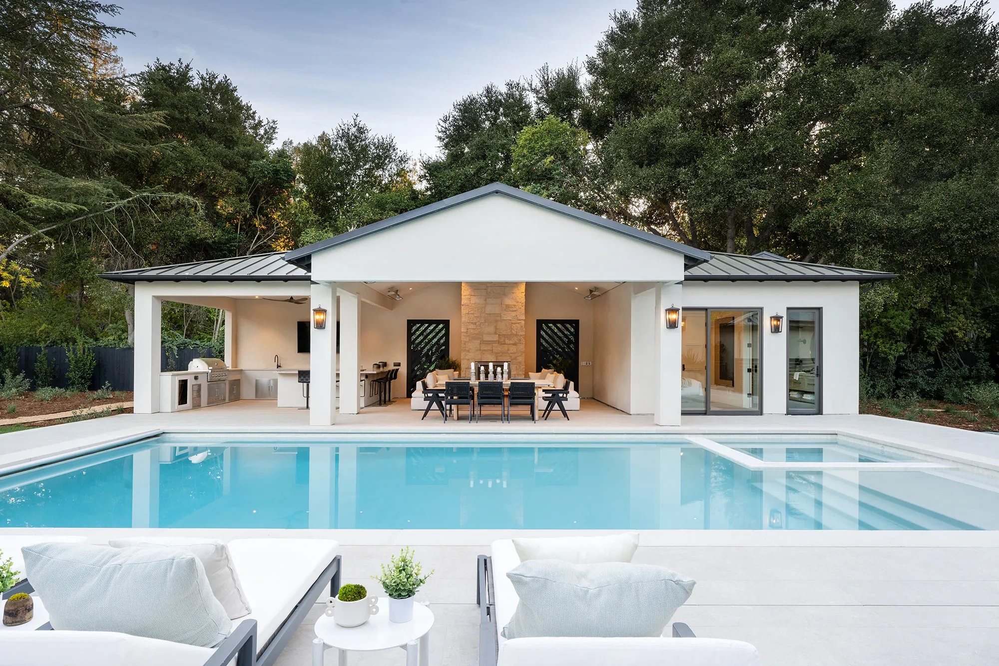 Shearer by GHG Builders — covered pool house across the swimming pool