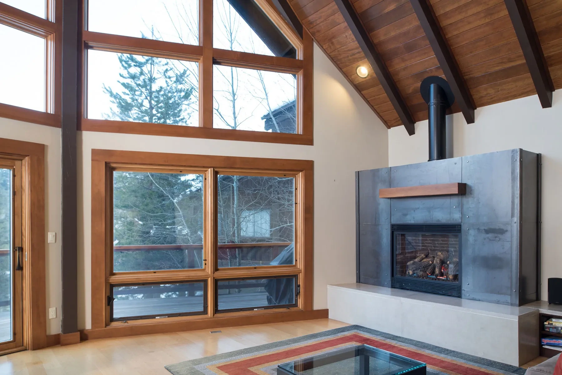Tiger Tail by GHG Builders — living room with wood-burning stove