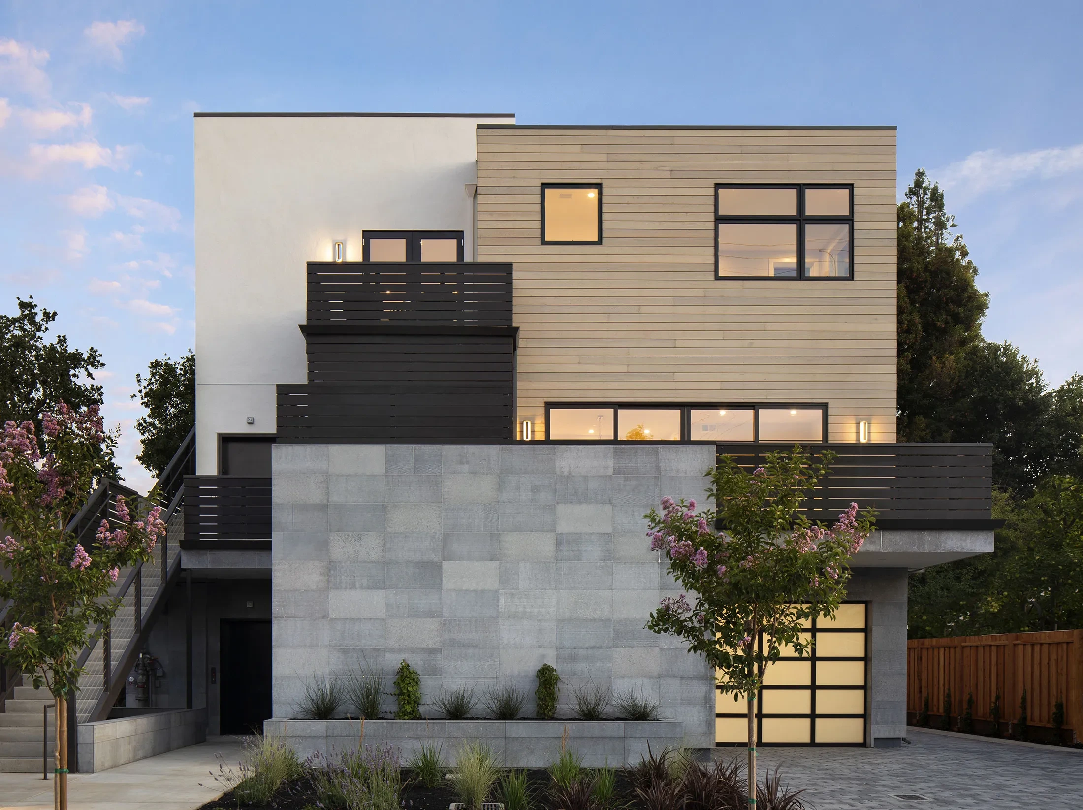 University Drive by GHG Builders — side elevation with board-formed concrete base