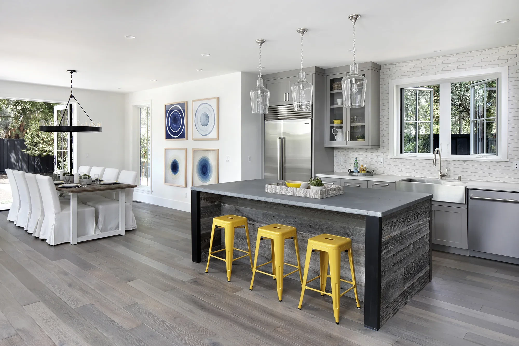 Valparaiso by GHG Builders — kitchen with island and yellow bar stools