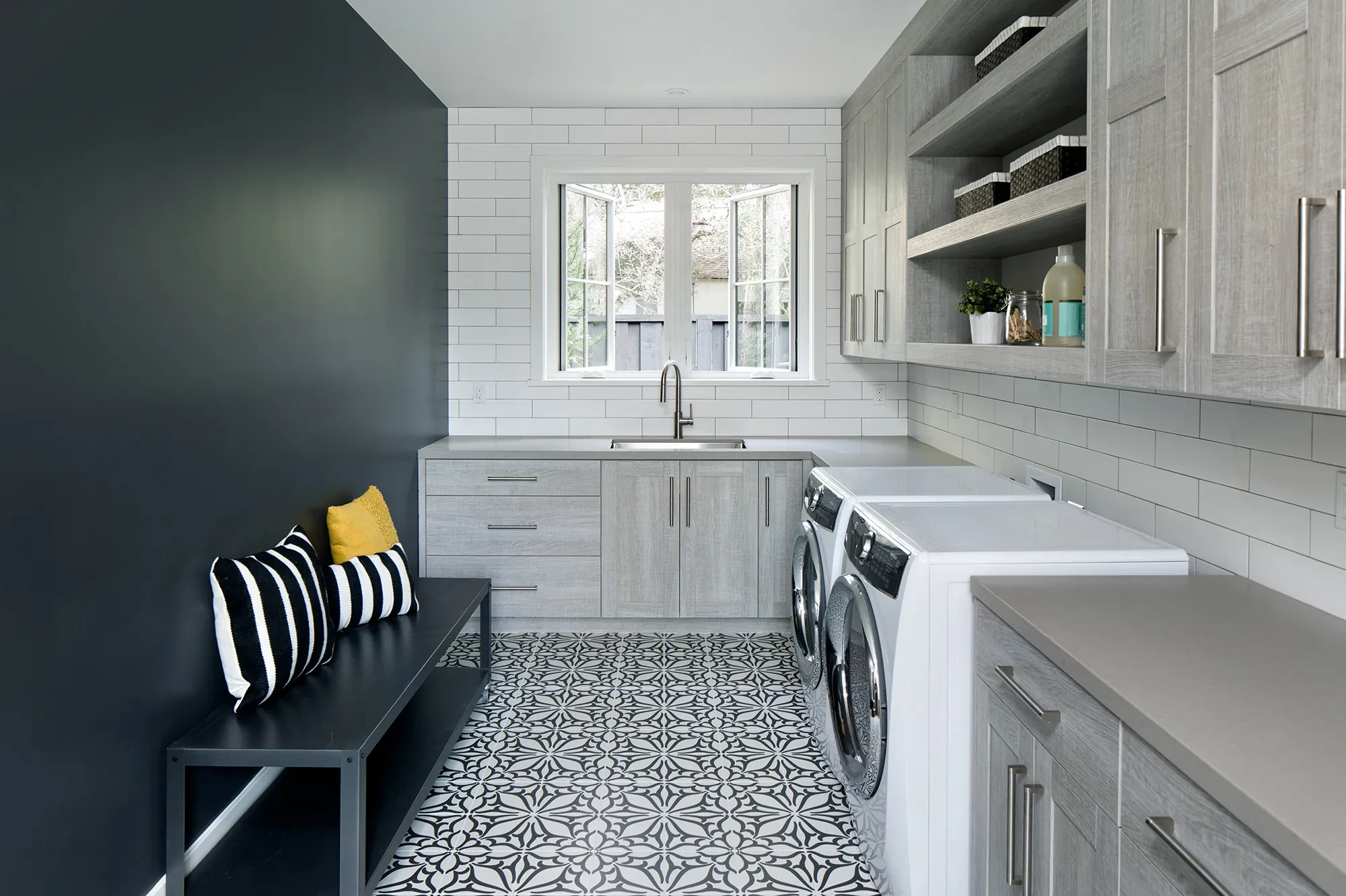 Valparaiso by GHG Builders — laundry room with patterned tile floor
