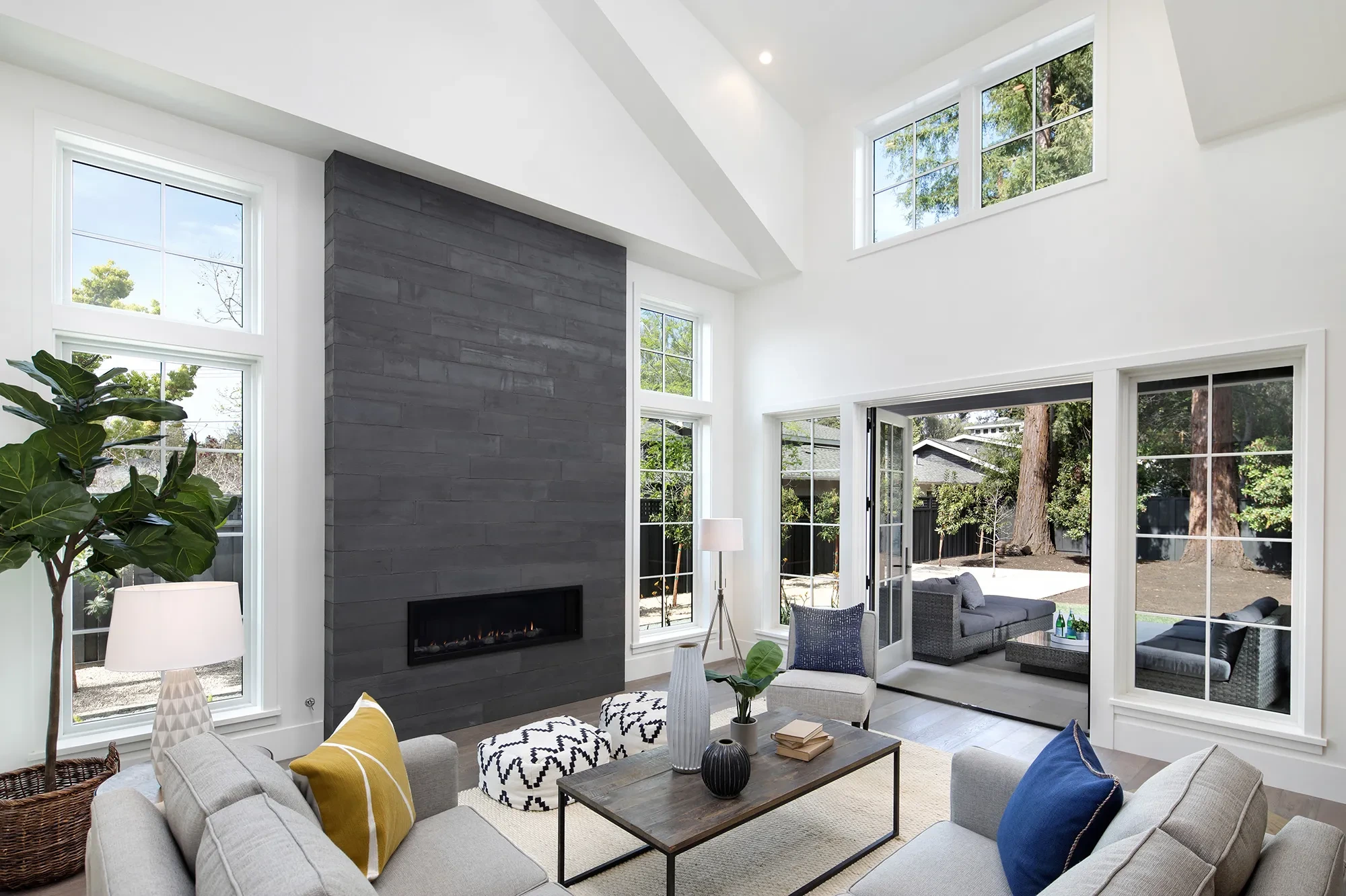 Valparaiso by GHG Builders — living room with concrete fireplace