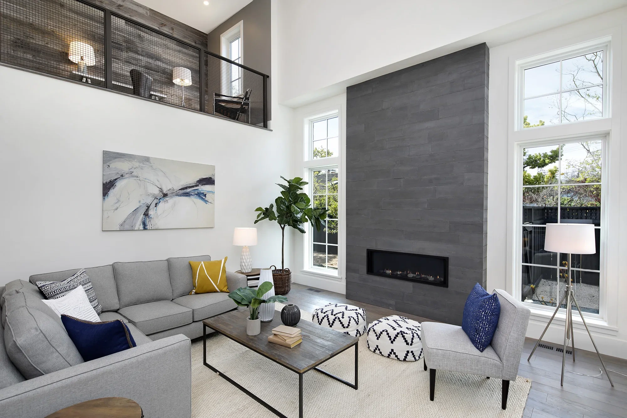 Valparaiso by GHG Builders — lounge with fireplace and corner windows