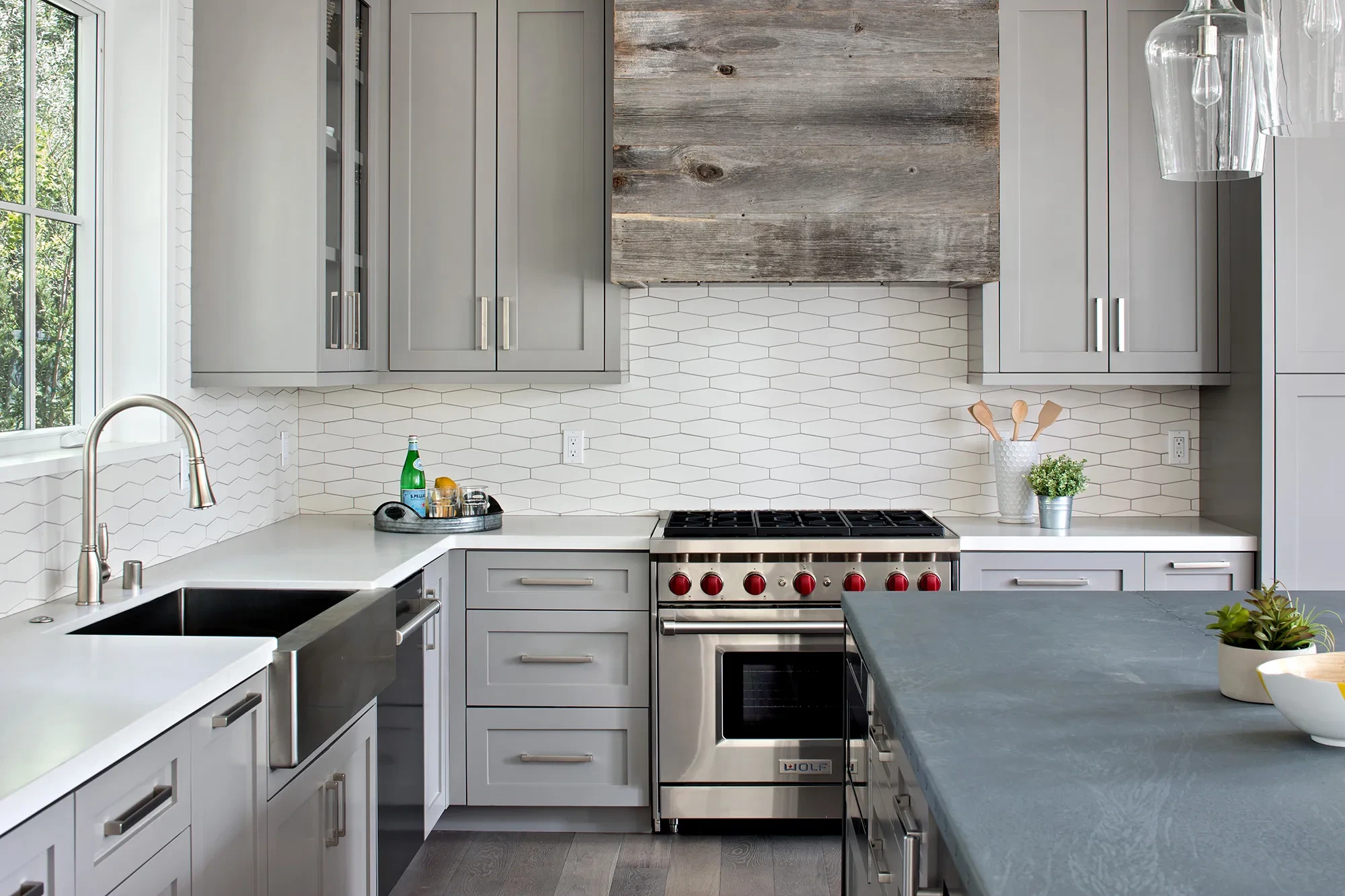 Valparaiso by GHG Builders — range and prep counter with tiled backsplash